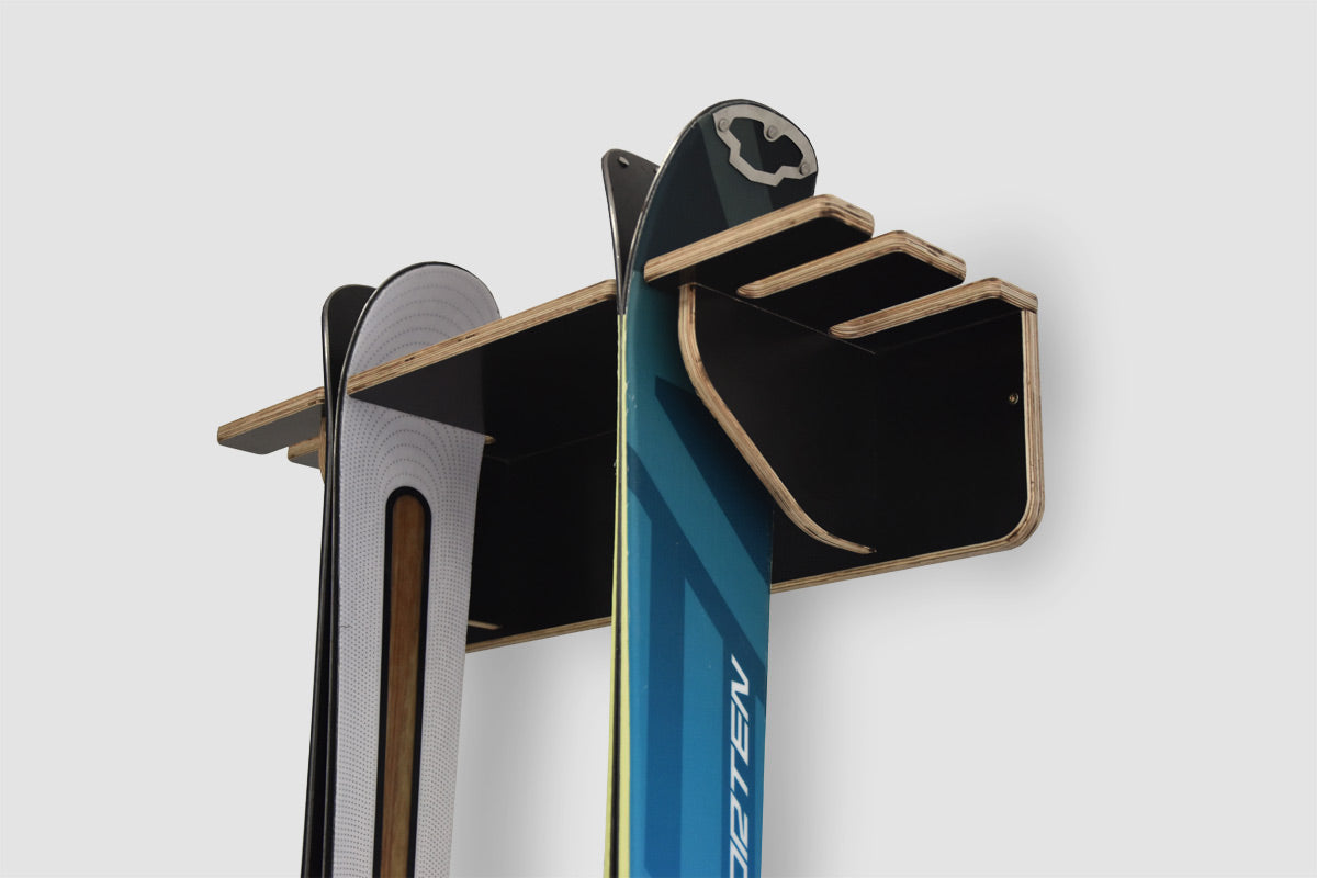Wall holder for 2 pairs of skis and poles