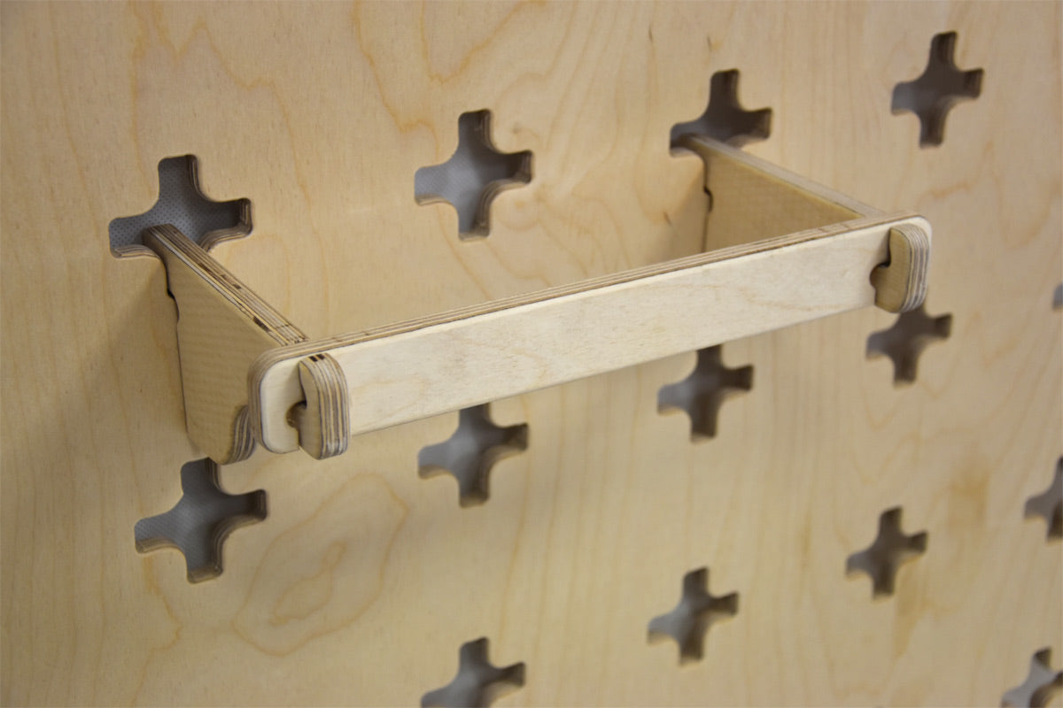 Wall-mounted holder for pliers