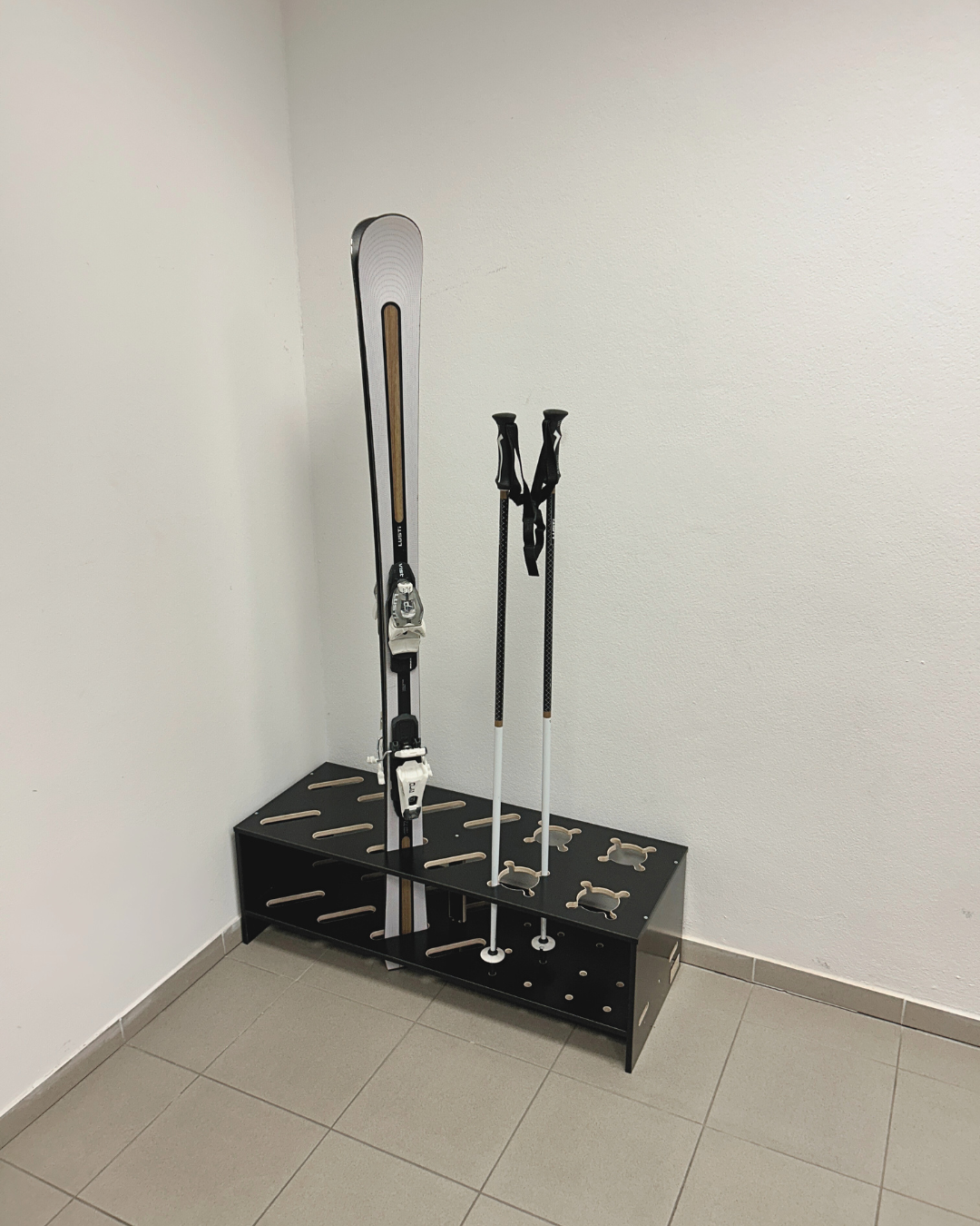 Combined wooden stand for skis and poles